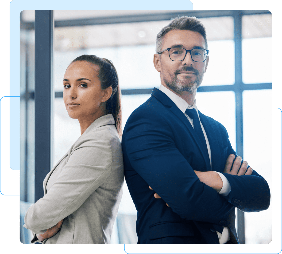 Business professionals standing back to back.